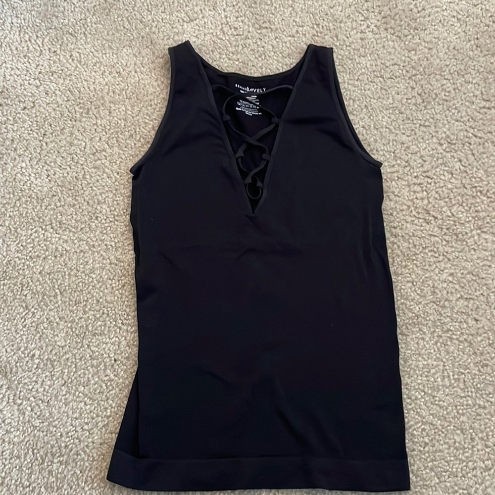 Size small black seams lovely tank with cross straps at v neck